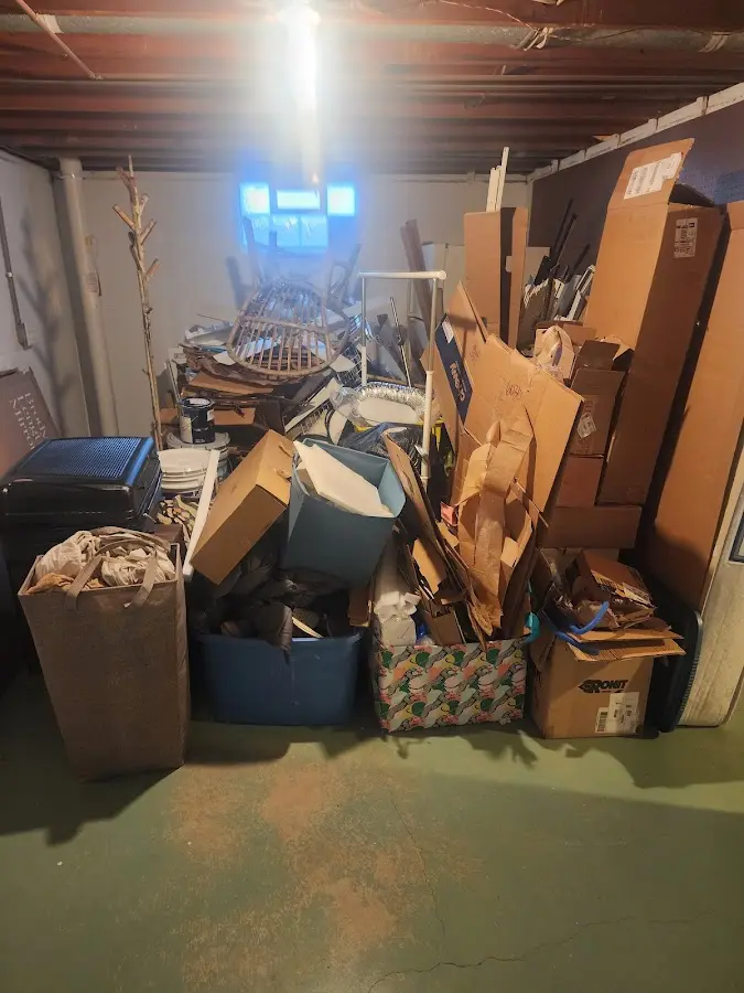 Roll-off dumpster container at job site for 2 Yard Dumpster Rental in Town 'n' Country